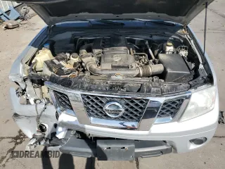 2012 Nissan Frontier SV z VIN 1N6AD0CW0CC458551, wystawiony jako Copart lot #73687094 z przebiegiem 129 461 mil mil oraz Szkoda całkowita • Salvage title. Historia ofert i sprzedaży dostępna na DreamBid. Obrazek 11.