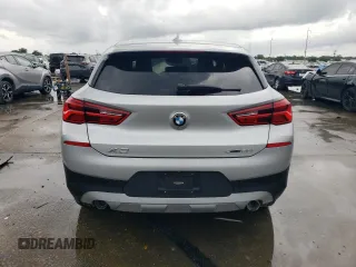 2018 BMW X2 sDrive28i with VIN WBXYJ3C32JEJ75719, listed as a Copart auction lot 60884755 with Not provided miles and Salvage title. Bid and sale history available at DreamBid. Image 6.