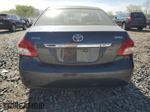 2010 Toyota Yaris with VIN JTDBT4K35A1355708, listed as a Copart auction lot 54347695 with 103,689 mi miles and Salvage Title. Bid and sale history available at carsss.com. Image 6.