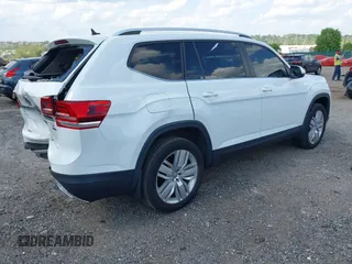 2019 Volkswagen Atlas SE z VIN 1V2UR2CAXKC539779, wystawiony jako IAAI lot #42188614 z przebiegiem 49 994 mil mil oraz . Historia ofert i sprzedaży dostępna na DreamBid. Obrazek 4.