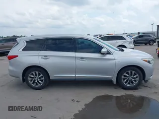 2015 Infiniti QX60 with VIN 5N1AL0MM7FC506839, listed as a IAAI auction lot 42134124 with 103,542 mi miles and . Bid and sale history available at DreamBid. Image 14.