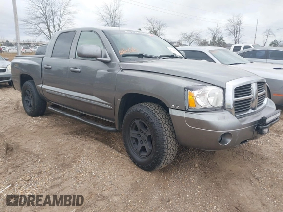 2005 Dodge Dakota SLT with VIN 1D7HE48N05S293699, listed as a IAAI auction lot 41541498 with 166,159 mi miles and . Bid and sale history available at carsss.com. Image 1.