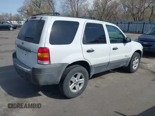 2006 Ford Escape Hybrid with VIN 1FMYU96H96KD56271, listed as a IAAI auction lot 41981621 with 156,825 mi miles and . Bid and sale history available at DreamBid. Image 4.