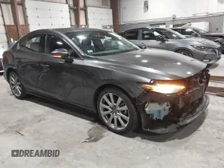 2020 Mazda 3 Premium with VIN 3MZBPBEM3LM123091, listed as a IAAI auction lot 41568213 with 68,515 mi miles and . Bid and sale history available at DreamBid. Image 1.