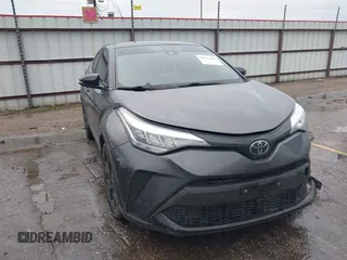 2021 Toyota C-HR LE with VIN JTNKHMBX0M1129080, listed as a IAAI auction lot 41321604 with 52,916 mi miles. Bid and sale history available at carsss.com. Image 1.
