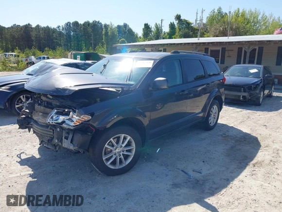 2017 Dodge Journey SXT with VIN 3C4PDCBG4HT589891, listed as a IAAI auction lot 42017420 with 135,740 mi miles and . Bid and sale history available at carsss.com. Image 2.