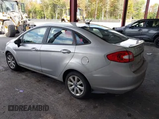 2013 Ford Fiesta SE with VIN 3FADP4BJ3DM173949, listed as a IAAI auction lot 40494276 with 141,061 mi miles. Bid and sale history available at carsss.com. Image 3.