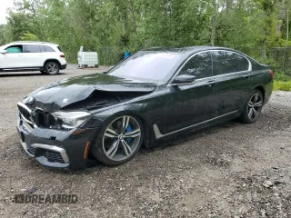 2016 BMW 7 Series 750i xDrive with VIN WBA7B0C5XGGF92265, listed as a Copart auction lot 64574435 with 117,898 mi miles and Clean title. Bid and sale history available at DreamBid. Image 1.