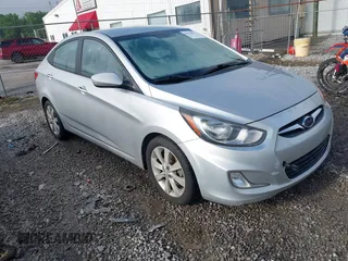 2012 Hyundai Accent GLS z VIN KMHCU4AE4CU244228, wystawiony jako IAAI lot #42220911 z przebiegiem 133 792 mil mil oraz . Historia ofert i sprzedaży dostępna na DreamBid. Obrazek 1.