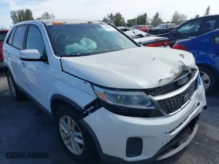 2014 Kia Sorento LX with VIN 5XYKT3A60EG535657, listed as a IAAI auction lot 41598090 with 143,223 mi miles. Bid and sale history available at carsss.com. Image 1.