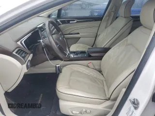 2017 Ford Fusion Titanium z VIN 3FA6P0SUXHR268559, wystawiony jako Copart lot #57456085 z przebiegiem 124 072 mil mil oraz Szkoda całkowita • Salvage title. Historia ofert i sprzedaży dostępna na DreamBid. Obrazek 7.