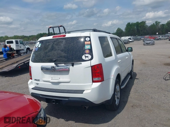 2014 Honda Pilot EX-L with VIN 5FNYF3H50EB005811, listed as a IAAI auction lot 42115804 with 216,033 mi miles and . Bid and sale history available at DreamBid. Image 16.