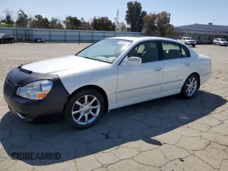 2005 Infiniti Q45 z VIN JNKBF01A65M101461, wystawiony jako Copart lot #50030865 z przebiegiem 211 747 mil mil oraz Tytuł czysty. Historia ofert i sprzedaży dostępna na DreamBid. Obrazek 1.