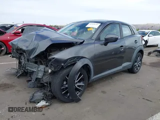 2018 Mazda CX-3 Touring z VIN JM1DKFC7XJ0312349, wystawiony jako IAAI lot #42368311 z przebiegiem 97 772 mil mil oraz . Historia ofert i sprzedaży dostępna na DreamBid. Obrazek 2.