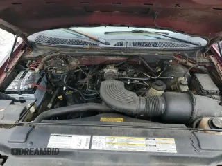 1999 Ford F-150 XL z VIN 1FTRX18L1XNB22080, wystawiony jako Copart lot #42920695 z przebiegiem 253 223 mil mil oraz Czysty tytuł • Clean title. Historia ofert i sprzedaży dostępna na DreamBid. Obrazek 11.