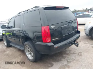 2014 GMC Yukon SLT with VIN 1GKS1CE02ER207447, listed as a IAAI auction lot 41604134 with 199,417 mi miles. Bid and sale history available at carsss.com. Image 3.