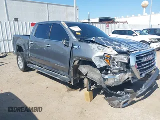 2019 GMC Sierra 1500 SLT z VIN 3GTP8DED7KG308047, wystawiony jako IAAI lot #41978970 z przebiegiem 112 662 mil mil oraz . Historia ofert i sprzedaży dostępna na DreamBid. Obrazek 1.