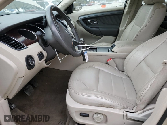 2011 Ford Taurus SEL z VIN 1FAHP2HW4BG171787, wystawiony jako Copart lot #54939445 z przebiegiem 125 882 mil mil oraz Czysty tytuł • Clean title. Historia ofert i sprzedaży dostępna na DreamBid. Obrazek 7.