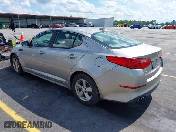 2015 Kia Optima LX with VIN 5XXGM4A79FG477619, listed as a IAAI auction lot 42561432 with 125,274 mi miles and . Bid and sale history available at DreamBid. Image 3.