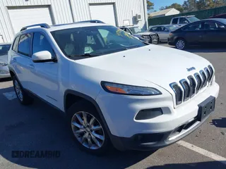 2015 Jeep Cherokee Limited with VIN 1C4PJMDS7FW688762, listed as a IAAI auction lot 41709877 with 154,499 mi miles. Bid and sale history available at carsss.com. Image 1.
