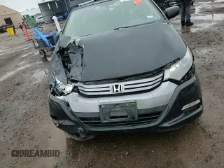 2010 Honda Insight LX with VIN JHMZE2H59AS022362, listed as a Copart auction lot 59442435 with 161,009 mi miles and Salvage title. Bid and sale history available at DreamBid. Image 13.