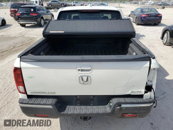 2018 Honda Ridgeline RTL-T z VIN 5FPYK3F6XJB000205, wystawiony jako Copart lot #51861315 z przebiegiem 83 684 mil mil oraz Nie do naprawy • Non repairable. Historia ofert i sprzedaży dostępna na DreamBid. Obrazek 6.