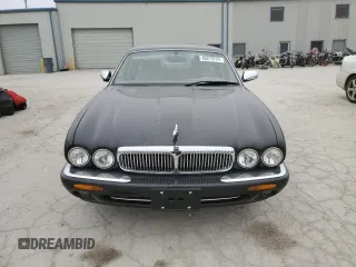 1999 Jaguar XJ z VIN SAJKD6043XC872105, wystawiony jako Copart lot #86270724 z przebiegiem Nie podano mil oraz Szkoda całkowita • Salvage title. Historia ofert i sprzedaży dostępna na DreamBid. Obrazek 5.