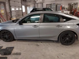 2023 Honda Civic Sport with VIN 19XFL2H80PE010679, listed as a IAAI auction lot 42026973 with 25,701 mi miles and . Bid and sale history available at DreamBid. Image 14.