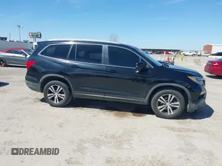2016 Honda Pilot EX-L with VIN 5FNYF6H58GB018830, listed as a IAAI auction lot 41814636 with 147,242 mi miles. Bid and sale history available at carsss.com. Image 13.