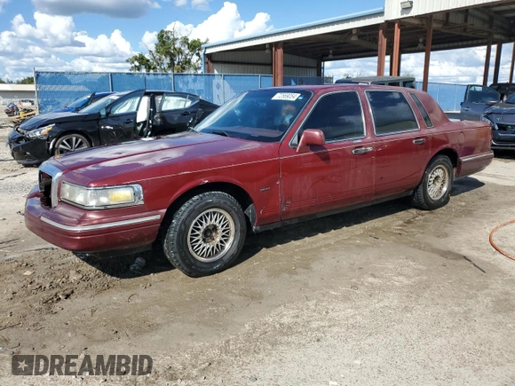 1996 Lincoln Town Car Signature z VIN 1LNLM82W3TY725921, wystawiony jako Copart lot #72569054 z przebiegiem 109 073 mil mil oraz Szkoda całkowita • Salvage title. Historia ofert i sprzedaży dostępna na DreamBid. Obrazek 1.