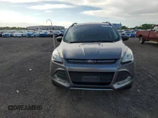2014 Ford Escape SE z VIN 1FMCU9GX3EUE26446, wystawiony jako Copart lot #57113865 z przebiegiem 145 699 mil mil oraz Szkoda całkowita • Salvage title. Historia ofert i sprzedaży dostępna na DreamBid. Obrazek 5.