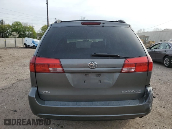 2005 Toyota Sienna XLE with VIN 5TDBA22C65S035980, listed as a Copart auction lot 54448335 with 292,194 mi miles and Salvage Title. Bid and sale history available at DreamBid. Image 6.