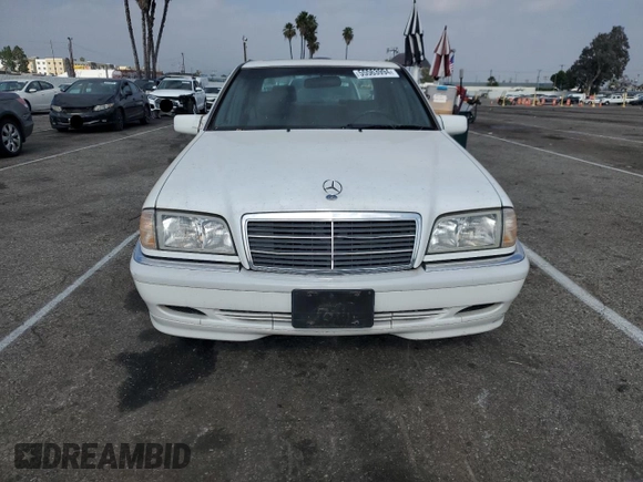 2000 Mercedes-Benz C 230 Kompressor with VIN WDBHA24G1YA820238, listed as a Copart auction lot 55563994 with 264,556 mi miles and Salvage Title. Bid and sale history available at carsss.com. Image 5.