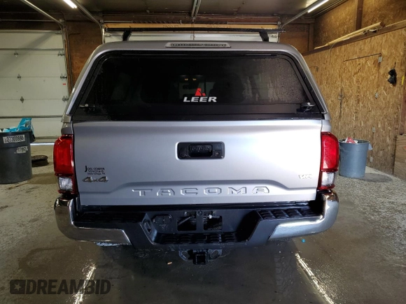 2021 Toyota Tacoma 4WD SR5 with VIN 3TMDZ5BN3MM103509, listed as a Copart auction lot 48461875 with 54,566 mi miles and Salvage Title. Bid and sale history available at carsss.com. Image 6.