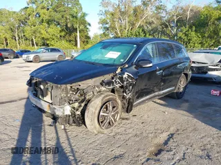 2019 Infiniti QX60 LUXE with VIN 5N1DL0MN0KC548592, listed as a IAAI auction lot 41305876 with 142,064 mi miles. Bid and sale history available at carsss.com. Image 17.