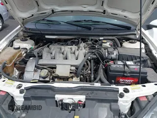 1999 Mercury Cougar z VIN 1ZWFT61L9X5753318, wystawiony jako IAAI lot #41982375 z przebiegiem 136 908 mil mil oraz . Historia ofert i sprzedaży dostępna na DreamBid. Obrazek 10.