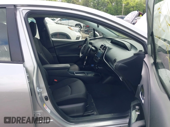 2022 Toyota Prius L Eco with VIN JTDKAMFU2N3161592, listed as a IAAI auction lot 42245464 with 146,891 mi miles and . Bid and sale history available at DreamBid. Image 5.