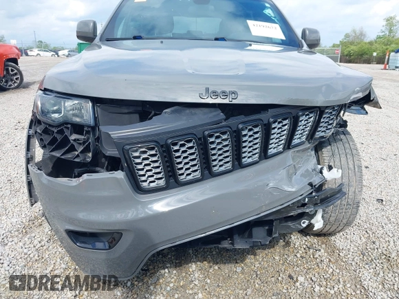2021 Jeep Grand Cherokee Laredo E with VIN 1C4RJFAG4MC700384, listed as a IAAI auction lot 42192672 with 54,525 mi miles and . Bid and sale history available at DreamBid. Image 18.