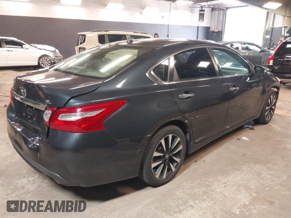 2018 Nissan Altima SR with VIN 1N4AL3AP2JC142302, listed as a IAAI auction lot 42013171 with 112,360 mi miles and . Bid and sale history available at carsss.com. Image 4.