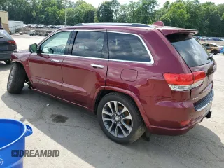 2017 Jeep Grand Cherokee Overland with VIN 1C4RJFCG5HC874130, listed as a Copart auction lot 65324695 with 101,588 mi miles and Salvage title. Bid and sale history available at DreamBid. Image 2.