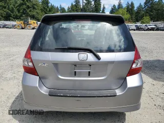2007 Honda Fit Sport with VIN JHMGD37617S043208, listed as a Copart auction lot 64594825 with 210,672 mi miles and Clean title. Bid and sale history available at DreamBid. Image 6.