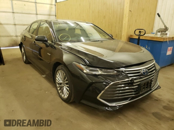 2021 Toyota Avalon Limited Hybrid z VIN 4T1CA1AB3MU001055, wystawiony jako Copart lot #62823372 z przebiegiem 14 776 mil mil oraz . Historia ofert i sprzedaży dostępna na DreamBid. Obrazek 1.