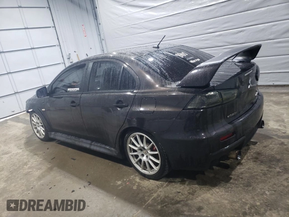2014 Mitsubishi Lancer Evolution GSR with VIN JA32W8FV5EU017979, listed as a Copart auction lot 47222615 with 109,632 mi miles and Salvage Title. Bid and sale history available at carsss.com. Image 2.