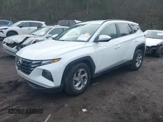 2022 Hyundai Tucson SEL z VIN 5NMJB3AE2NH141296, wystawiony jako IAAI lot #41534492 z przebiegiem 76 383 mil mil oraz . Historia ofert i sprzedaży dostępna na DreamBid. Obrazek 16.