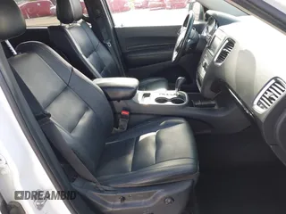 2013 Dodge Durango Crew with VIN 1C4SDHDT2DC679600, listed as a IAAI auction lot 42215737 with 128,499 mi miles and . Bid and sale history available at DreamBid. Image 5.