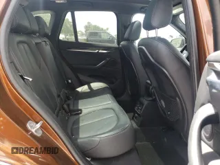 2016 BMW X1 xDrive28i with VIN WBXHT3C31GP880132, listed as a Copart auction lot 69129132 with 74,759 mi miles. Bid and sale history available at carsss.com. Image 6.