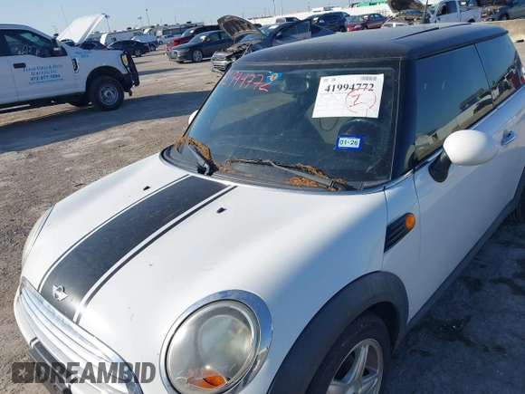 2009 MINI Cooper Hardtop with VIN WMWMF33569TZ20989, listed as a IAAI auction lot 41994772 with 152,944 mi miles. Bid and sale history available at carsss.com. Image 6.