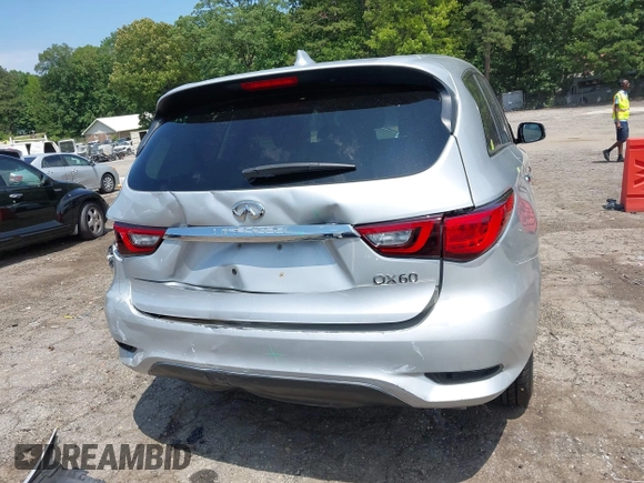 2020 Infiniti QX60 Luxe z VIN 5N1DL0MN7LC529460, wystawiony jako IAAI lot #42338248 z przebiegiem 97 883 mil mil oraz . Historia ofert i sprzedaży dostępna na DreamBid. Obrazek 17.