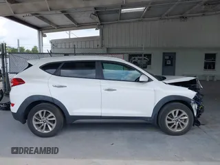 2016 Hyundai Tucson SE z VIN KM8J33A48GU192135, wystawiony jako IAAI lot #42216339 z przebiegiem 79 283 mil mil oraz . Historia ofert i sprzedaży dostępna na DreamBid. Obrazek 13.