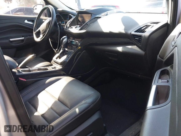 2015 Ford Escape Titanium with VIN 1FMCU0J90FUA43720, listed as a IAAI auction lot 42541048 with 98,948 mi miles and . Bid and sale history available at DreamBid. Image 5.